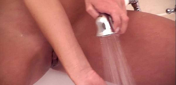  Lena Love is showering - fingering her tight pussy.